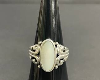 796 Lot 650h Sterling silver ring white cabochon ornate scroll