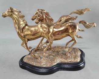 133 Lot 582 Vintage brass running horses sculpture