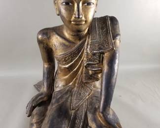 125 Lot 328 Antique Burmese gilt wood kneeling monk sculpture