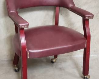 158 Lot 185 Contemporary faux leather arm chair on casters