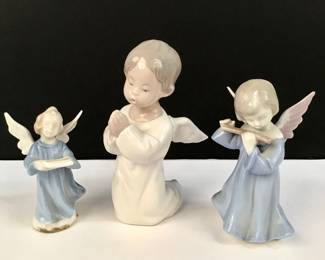 677 Lot 472 Trio of vintage porcelain angel figures