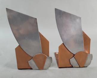 312 Lot 640 Art Deco polished aluminum and copper bookends