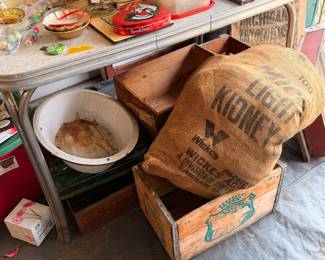 Old cherry boxes and whiskey boxes and potato bags 