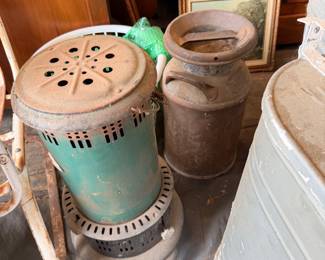 Vintage milk can and kerosene heater 