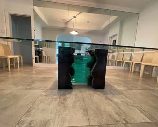 Roche Bobois glass dining table and leather chairs