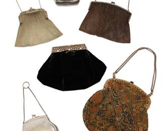 1249 A group of six ladies' evening purses 20th century Comprising two chain mail mesh purses, including a Napier purse with gilt-tone mesh and delicate pierced frame with interior monogram, and a German silver purse with sterling silver mesh, as well as two silver-toned metal case-style bags, one with inscription and monogram from 1904, and one with interior paper lining with pockets and a finger ring chain strap, together with a Bergdorf Goodman black velvet bag with gold-toned metal and rhinestone clasp, and a fine needlework embroidery fabric handbag with gold-toned metal frame and chain handle Three variously marked/labeled for maker and/or material 6 pieces Largest 7 3/4 x 7 3/4 in.; smallest height 3 in., width 3 3/4 in., depth 1 5/8 in. Estimate: $200 - $300