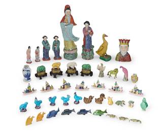 1232 A large group of Chinese glazed ceramic figures 20th century Most impressed or stamped: CHINA; a few of the larger also impressed with maker's mark or apocryphal reign mark Comprising six figures of women, a diminutive vase, various sets or groups of animals including crabs, ducks, roosters, elephants, and others, and a large group of boats 110 pieces approximately Largest height 12 7/8 in., width 4 1/4 in., depth 3 in. Estimate: $300 - $500