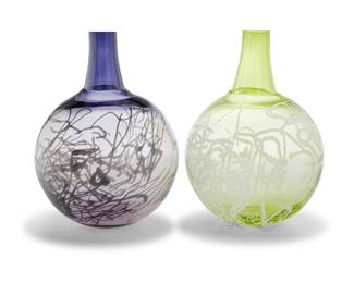 1169 Gunnel Sahlin (b. 1954) Two glass 'Scribble' vases for Kosta Boda, early 21st century Each etched with number: KOSTA BODA / G SAHLIN / 7040437 2 pieces Height of each 11 1/8 in., diameter 8 in. Estimate: $200 - $400