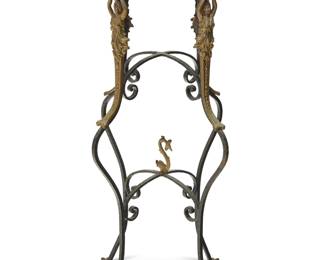 1104 A Neoclassical style wrought iron plant stand Early 20th century The wood top with enameled metal edges decorated with meandering motif, above gold-toned metal mermaids mounted to an enameled wrought iron base Height 37 1/4 in., width 14 1/2 in., depth 14 1/2 in. Estimate: $200 - $300