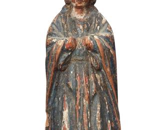 1243 A Continental polychrome carved wood santo 17th/18th century Depicting a robed figure Height 6 1/2 in., width 2 7/8 in., depth 2 5/8 in. Estimate: $300 - $500