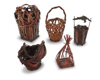 1268 Five Japanese woven bamboo ikebana baskets 20th century 5 pieces Largest height 16 1/2 in., width 11 5/8 in., depth 11 5/8 in.; smallest height 11 in., width 7 in., depth 6 3/4 in. Estimate: $300 - $500