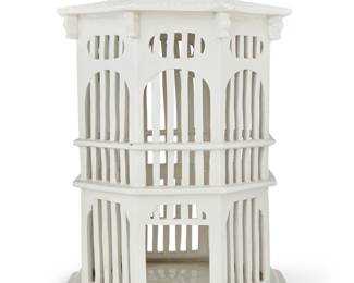 1119 A glazed ceramic birdcage and polychrome pottery bird Mid/late 20th century Bird signed and inscribed: Gloria a Dios / Costa Rica 2 pieces Height of cage 21 in., width 13 1/4 in., depth 13 1/4 in.; height of bird 3 1/2 in., length 8 in., width 2 7/8 in. Estimate: $200 - $400