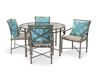 1198 Richard Frinier (b. 1946) A 'Venetian' patio breakfast table set for Brown Jordan, late 20th/early 21st century Originally designed 1987 Each numbered to factory label In the Neoclassical style, comprising a glass-top table and four armchairs, each chair with X-form seatback and stretcher, with possibly later seat cushions and pillows 5 pieces Table height 29 1/4 in., diameter 49 in.; height of chairs 35 1/4 in., width 22 1/2 in., depth 24 in. Estimate: $500 - $700