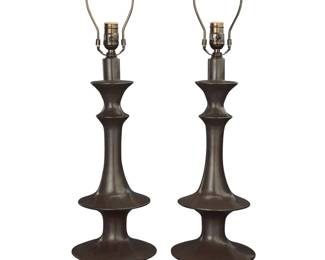 1042 A pair of Contemporary copper table lamps Early 21st century Each impressed: M The tiered bases each issuing a single light, electrified 2 pieces Height of each without harp 25 1/4 in., diameter 8 5/8 in.; overall height 32 1/4 in. Estimate: $300 - $500