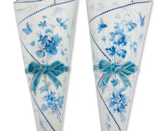 1348 A near pair of Continental porcelain wall pockets/vases Early/mid-20th century Each impressed verso: H.A. & Co. / 549 Hand-painted with flowers and insects 2 pieces Height of each 12 in., width 4 3/4 in., depth 2 3/8 in. Estimate: $100 - $200