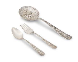 1302 A Kirk & Son sterling silver 'Repousse' part flatware service Mid-20th century Each with factory marks for sterling Comprising: 6 salad forks (6 1/4 in.) 6 teaspoons (5 7/8 in.) 1 berry spoon (9 1/4 in.) 13 pieces Total sterling weight 15.5 oz. troy approximately Estimate: $300 - $500