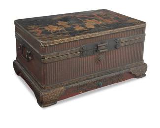 1069 A Chinese lacquered wood box Late Qing dynasty (1644-1912) or later With enamel and gilt-painted figural scene to lid above a rattan-clad body Height 9 3/4 in., width 19 1/4 in., depth 12 3/4 in. Estimate: $500 - $700