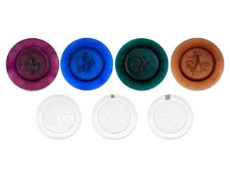 1244 A collection of Daum and Lalique glass commemorative plates Two works: A set of Daum pâte de verre 'Four Seasons' plates, 1969-1970 Edition: 81/2,000 Each etched with edition; each titled, marked for maker, and dated in the mold relief recto Within four original boxes 4 pieces Diameter of each 10 1/2 in.; boxes total stacked height 4 in., width 11 1/2 in., depth 11 1/4 in. Three Lalique annual plates, 1969-1974 Each etched: Lalique ® France Comprising 'Papillon' (1969), 'Owl' (1971), and 'Silver Pennies' (1974) 3 pieces Diameter of each 8 3/8 in. 7 pieces total Estimate: $200 - $400