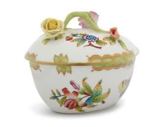 1155 A Herend porcelain 'Queen Victoria' cordiform box 20th century With blue printed factory mark above painted shape number and pattern: 6001/VBO / 7/C Height 4 1/2 in., width 5 1/4 in., depth 4 3/4 in. Estimate: $100 - $200