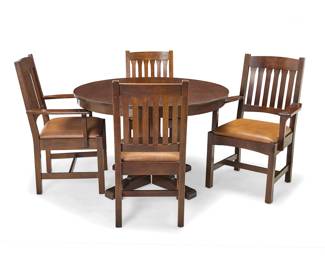 1029 A Stickley pedestal dining table, no. 713, and four chairs, no. 37 1999 Each with factory burn mark and applied metal Mission Reissue label; additionally stamped with date and: 89 323 37 [or] 89 324 37 [or] 89 713; table impressed: VN 22 Comprising one circular table with two leaf extensions, two armchairs, and two side chairs, each chair with slatted back above a leather upholstered seat cushion, the legs joined by an H-stretcher 7 pieces Table height 30 in., diameter 46 in.; width of each leaf 14 3/4 in.; height of armchairs 39 1/4 in., width 26 1/2 in., depth 23 1/2 in.; height of side chairs 38 in., width 28 1/2 in., depth 21 1/2 in. Estimate: $700 - $900