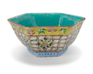 1188 A Chinese Famille Rose porcelain bowl Early 20th century Bearing an apocryphal reign mark for Yongzheng Period (1678-1735) Height 2 1/8 in., width 4 7/8 in., depth 4 1/4 in. Estimate: $200 - $300