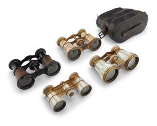 1258 Four pairs of opera glasses Early 20th century One pair marked: KLUNE & FLOBERG SACRAMENTO; another marked: F.Z.M. / 7849/61 Comprising three mother of pearl and one housed in leather-clad case, each with telescoping focus 4 pieces Largest extended length 1 3/4 in., width 4 1/8 in., depth 3 1/4 in.; case height 4 in., width 6 1/4 in., depth 2 3/4 in. Estimate: $250 - $350