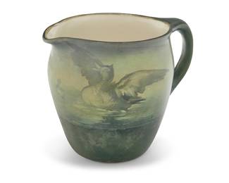 1300 Franz A. Bischoff (1864-1929) "Ducks in a Pond," early 20th century Painted American Belleek porcelain pitcher Signed: Franz A. Bischoff; stamped with factory mark: BELLEEK Accompanied by a copy of the hardcover book in which the pitcher on offer is illustrated: Stern, Jean. "Franz A. Bischoff: the Life & Art of an American Master." The Irvine Museum, 2010 Height of pitcher 6 in., width 7 1/4 in., depth 5 3/4 in.; book height 12 3/8 in., width 9 5/8 in., depth 1 1/8 in. Estimate: $500 - $700