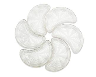 1237 A set of six René Lalique glass 'Pissenlit' crescent dishes Second quarter 20th century Originally designed 1921 Each debossed: R LALIQUE 6 pieces Width of each 8 1/8 in., depth 5 1/4 in. Estimate: $300 - $500
