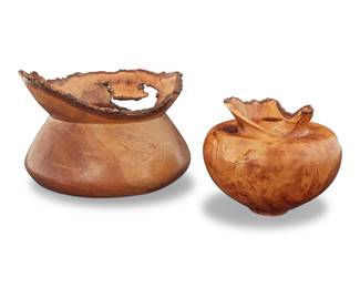 1090 Two turned wood bowls Late 20th century One inscribed with possible date and inscription: LABAUGH / 00 / SOUTHERN RED OAK / 5/150 / ALABAMD CHAMPION; the other with incised signature, date, and inscription: D FORD / NOVA SCOTIA / MAPLE BURL / 1999 2 pieces Larger height 7 3/4 in., width 10 3/4 in., depth 10 1/2 in.; height of smaller 6 1/2 in., diameter 7 5/8 in. Estimate: $400 - $600