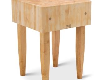 1117 A John Boos & Co. maple butcher block table Early 21st century With impressed factory mark Height 34 1/4 in., width 23 3/4 in., depth 23 3/4 in. Estimate: $500 - $700