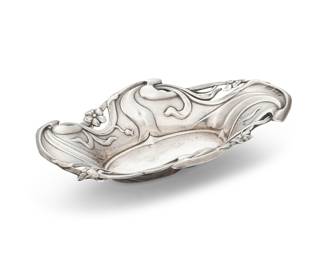1326 An English Art Nouveau sterling silver tray 1907 With English hallmarks for sterling, Birmingham, date, and maker: S & Co. With openwork foliate rim Height 1 1/8 in., width 6 in., depth 3 5/8 in. 1.5 oz. troy approximately Estimate: $200 - $400