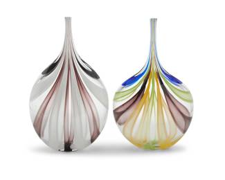 1158 Chris McCarthy (20th/21st century) Two studio glass vases, late 20th century Each with etched signature: C. McCarthy 2 pieces Taller height 11 1/4 in., width 6 7/8 in.; height of shorter 11 1/8 in., width 7 in. Estimate: $400 - $600