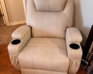 Faux-leather home theater recliner/swivel rocker.