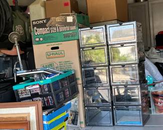 about 30 oil paintings, storage, guitar, books, toys and more