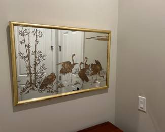 1980s gold crane mirror made by reliable manufacturing company Inc. dated 1983