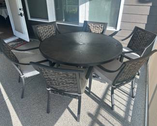 Patio table and six matching chairs made in Indonesia, 2023 like new