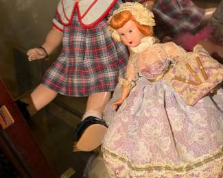 Another Shirley Temple (1930s?) (on left) and  Nancy Ann Storybook doll on right