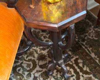 Accent table with fancy carved base