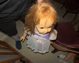 missing some hair, probably from all of her years looking down from the 2nd floor without a proper spa date!