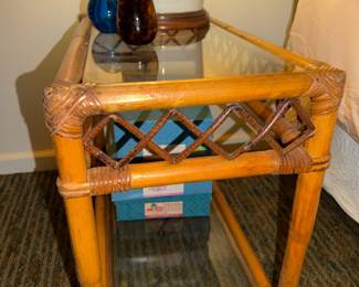 Rattan side table with glass top