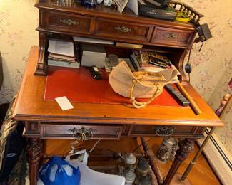 Victorian Secretary' writing desk with lots of small drawers and ornate carving