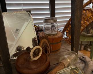 Vintage beveled vanity mirror with Acme jar and treen