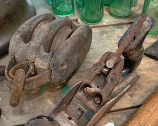 Antique wooden pulley block and cast iron hand plane