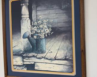 Framed daisies in watering can print, blue mat