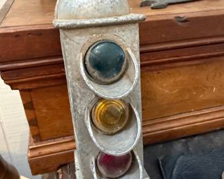 Vintage metal traffic light with colored lenses