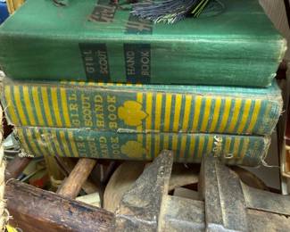 Vintage Girl Scout Handbooks with red fishing lure