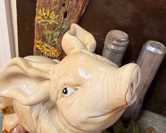 Ceramic pig figurine and painted driftwood art