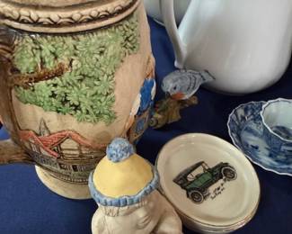 Majolica style cottage scene stein