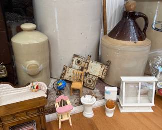 Stoneware crocks and jugs with dollhouse miniature furniture