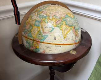 World globe on mahogany floor stand